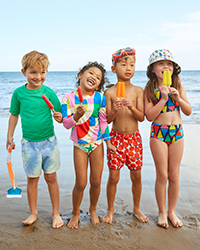 Swimwear, kids in bright print swimwear, shop swim