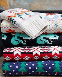 holiday pajamas folded and stacked on each other