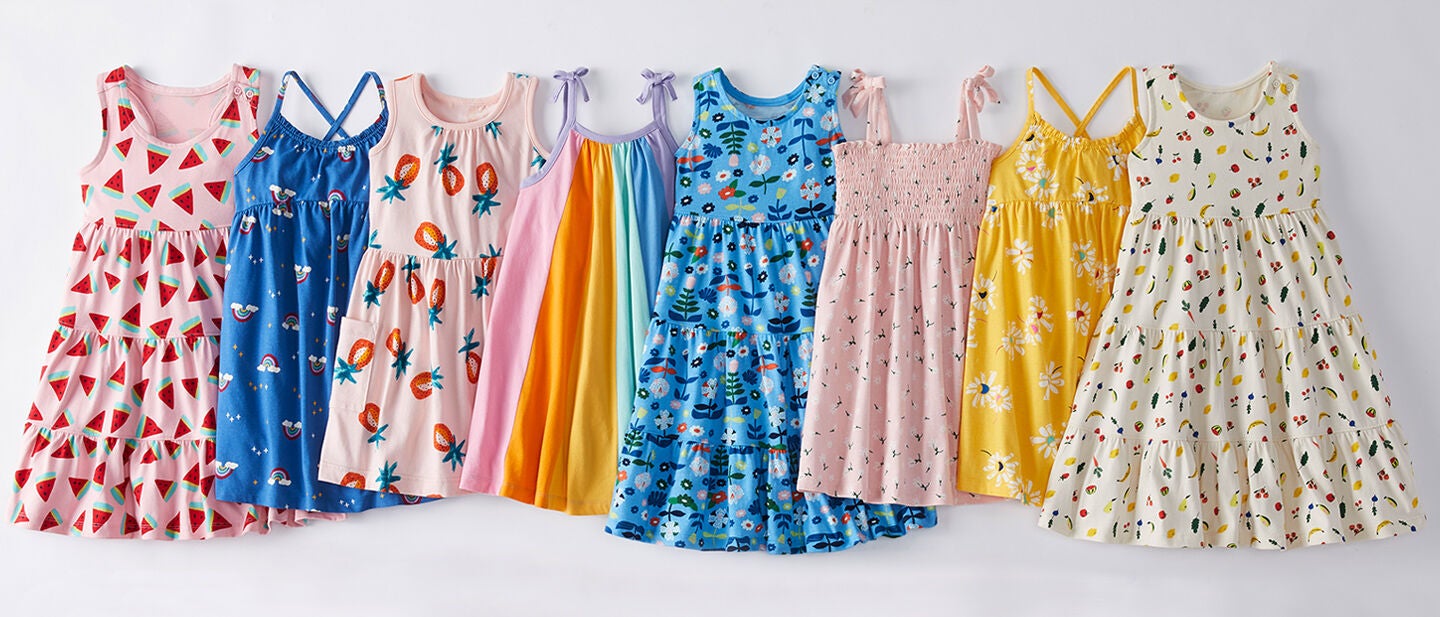 summer print dresses hanging on a string