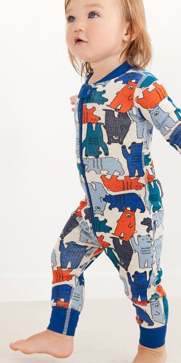 baby in bear print footless sleeper