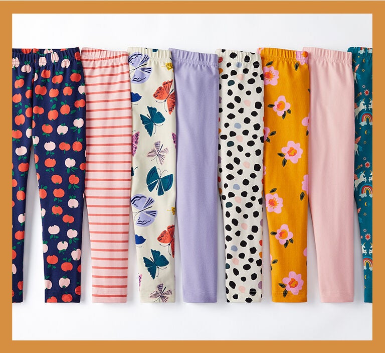 A flat lay of colorful leggings
