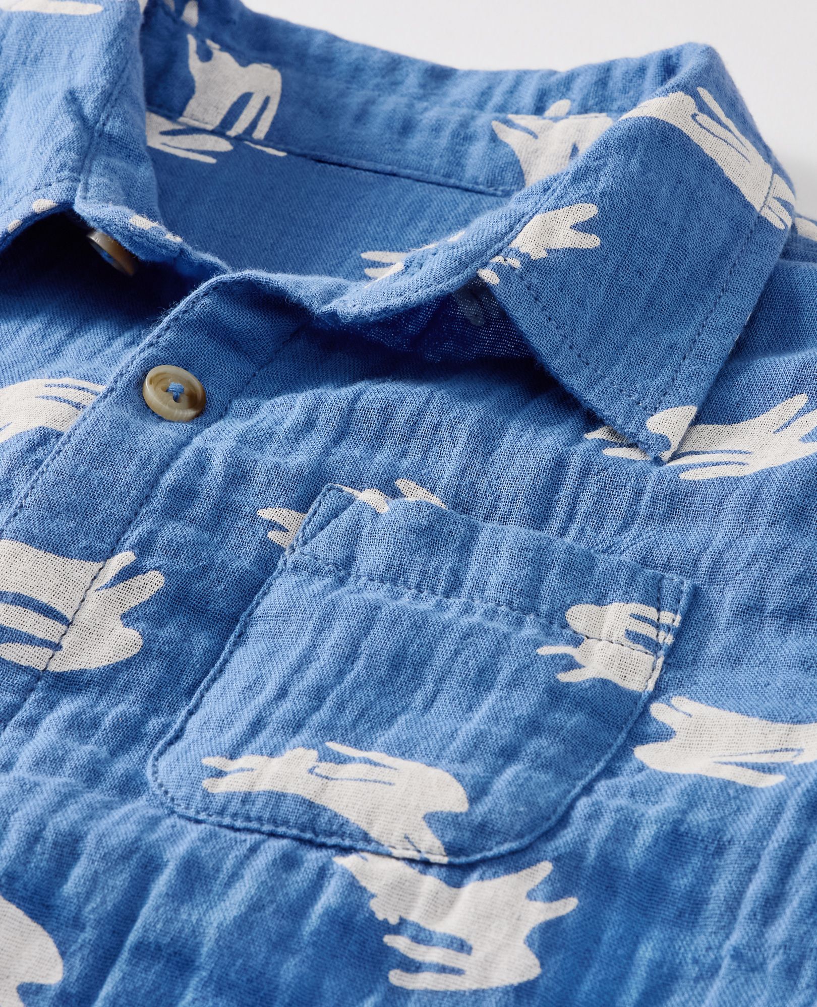 Easter Muslin Button Up Shirt in Hopping Bunnies on Blue - main