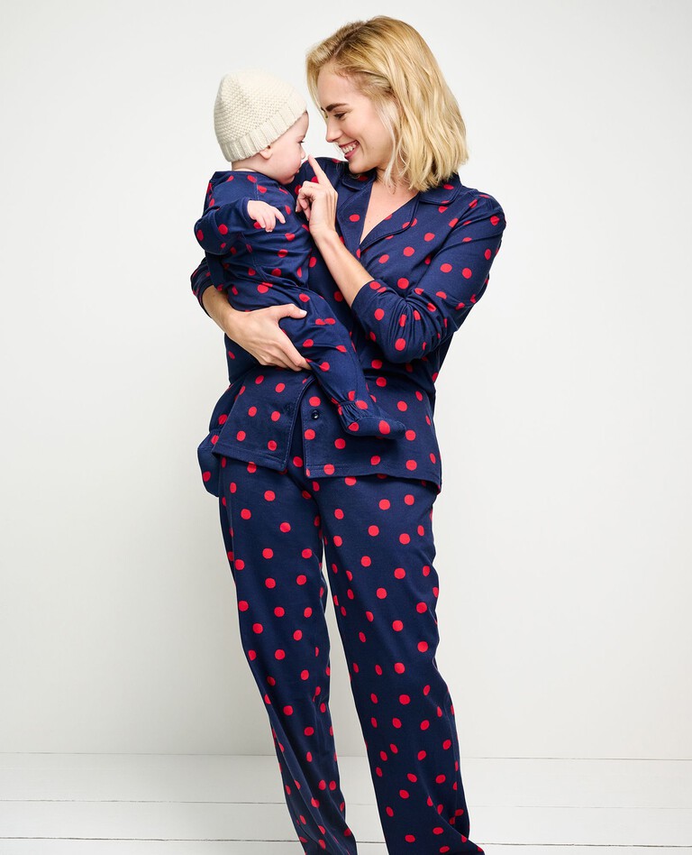 Baby Footed Sleeper In Pima Cotton in Red Dots on Navy - main