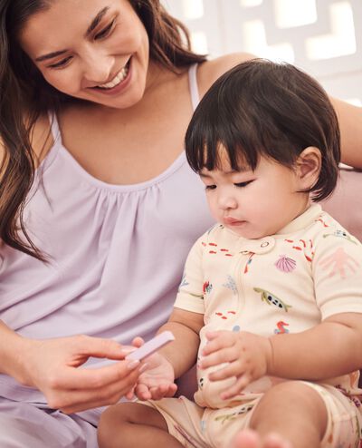 Baby 2-Way Zip Shortie Sleeper in Gentle Ocean on Ecru - main