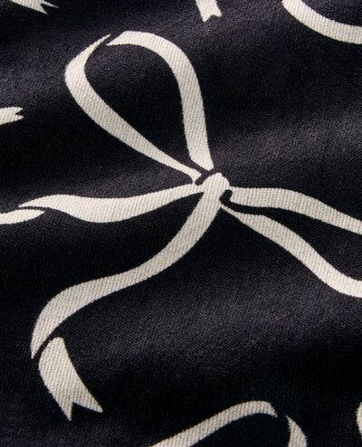 Sleeveless Velvet Bow Back Jumper in Bows on Black - main
