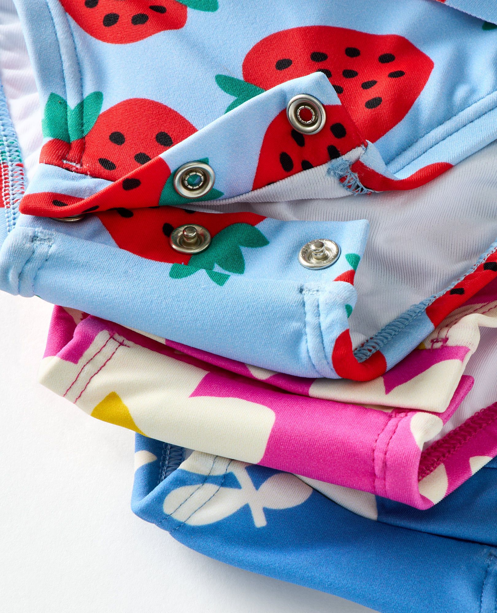 Baby One-Piece Skirted Rashguard Swimsuit in Strawberry Sweetness on Blue - main