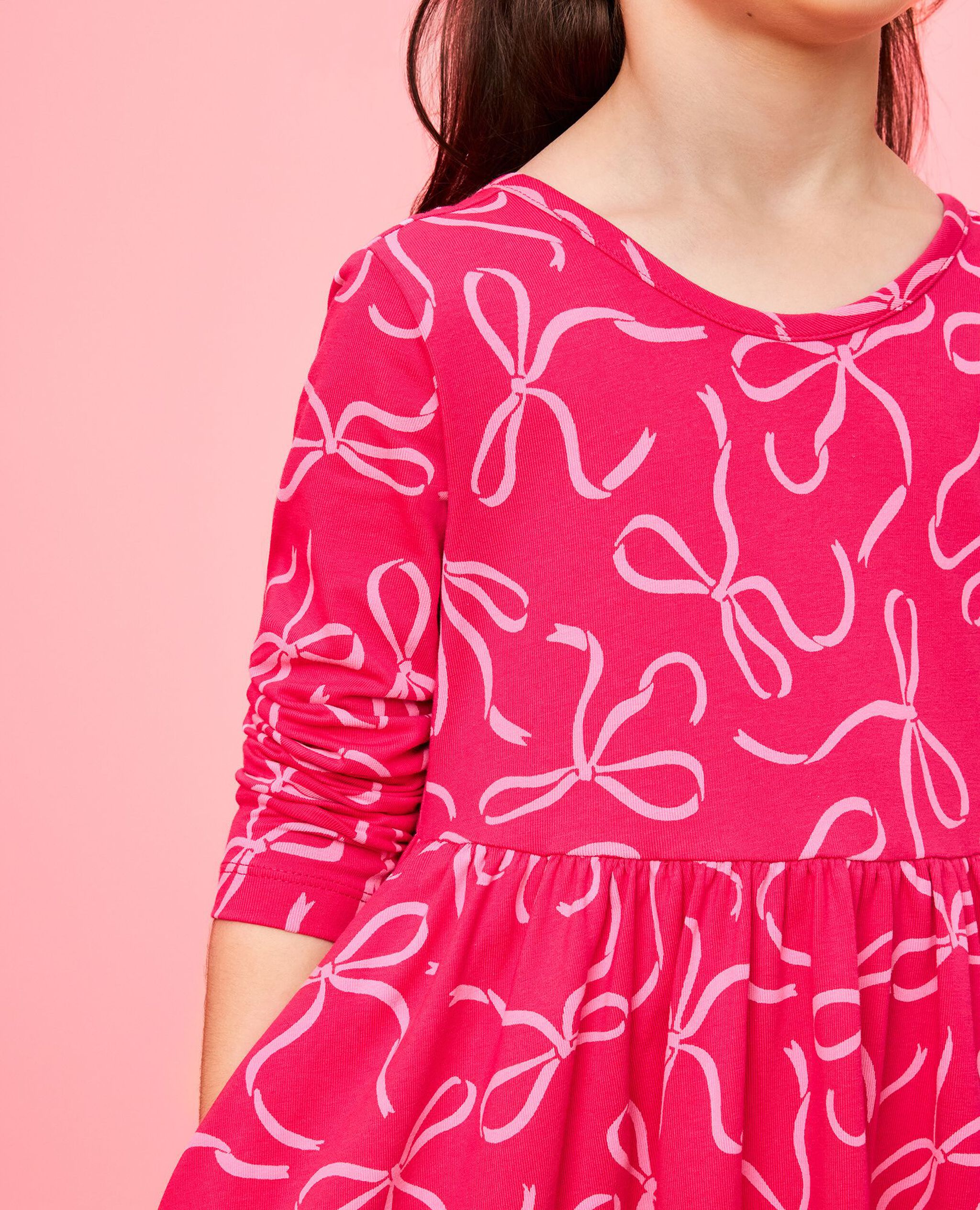 Long Sleeve Ruffle Skater Dress with Pockets in Bows on Beetroot Pink - main