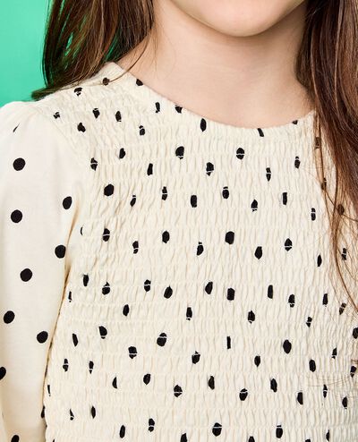 Long Sleeve Smocked Peplum Top in Black Dots on Ecru - main