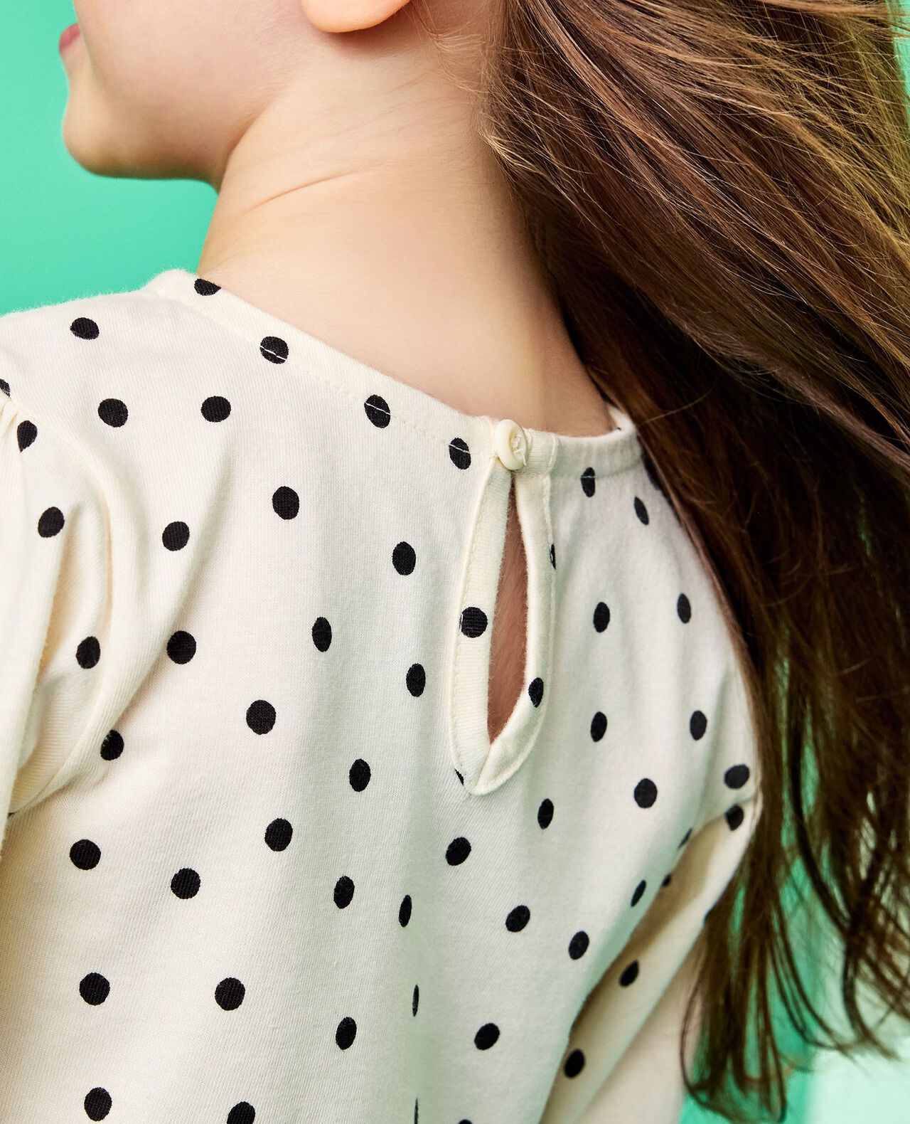 Long Sleeve Smocked Peplum Top in Black Dots on Ecru - main