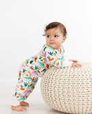 Baby Zip Sleeper In Organic Cotton in Rainbow Dinos - main