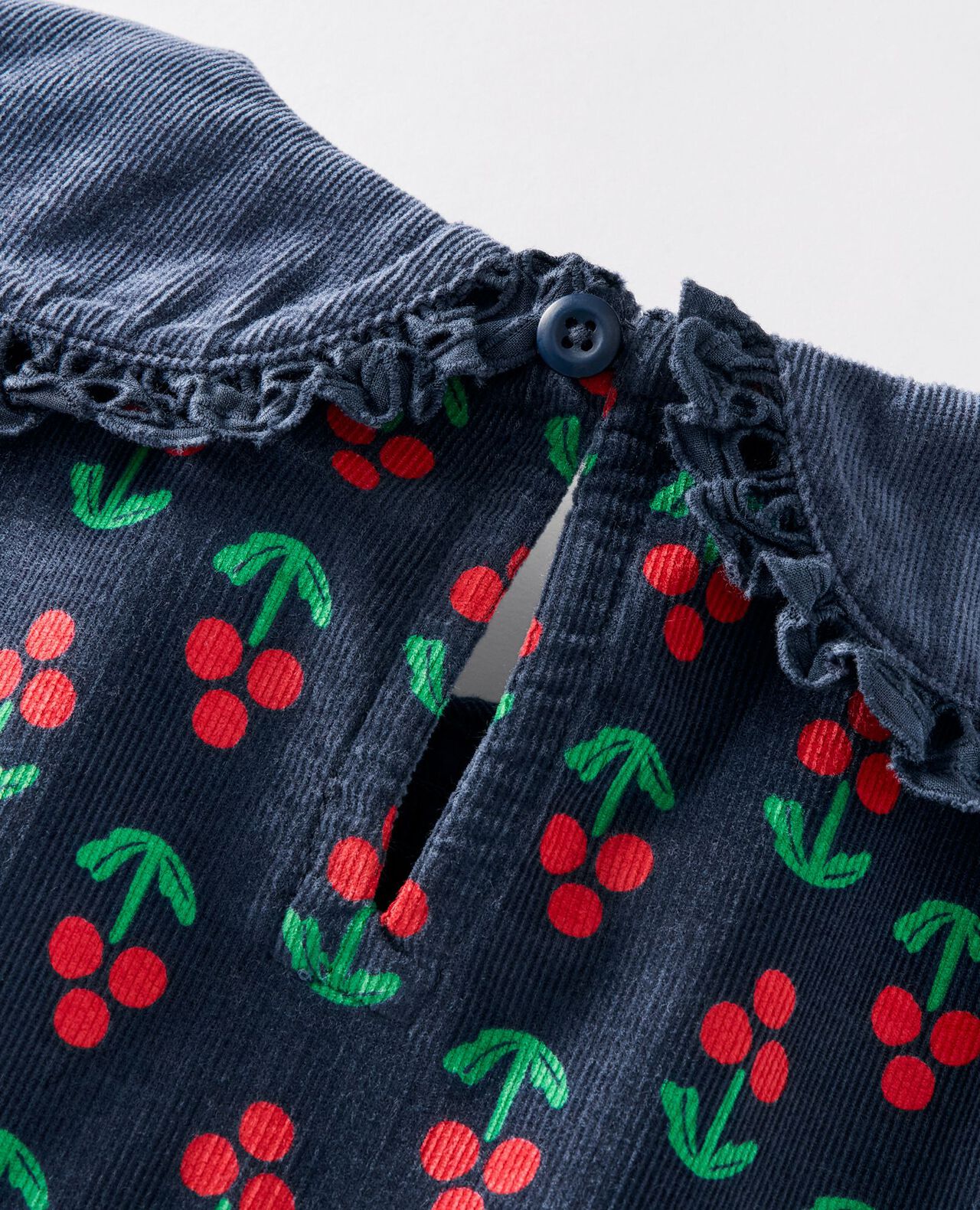 Embroidered Corduroy Dress with Pockets in Holly Berries on Midnight Blue - main