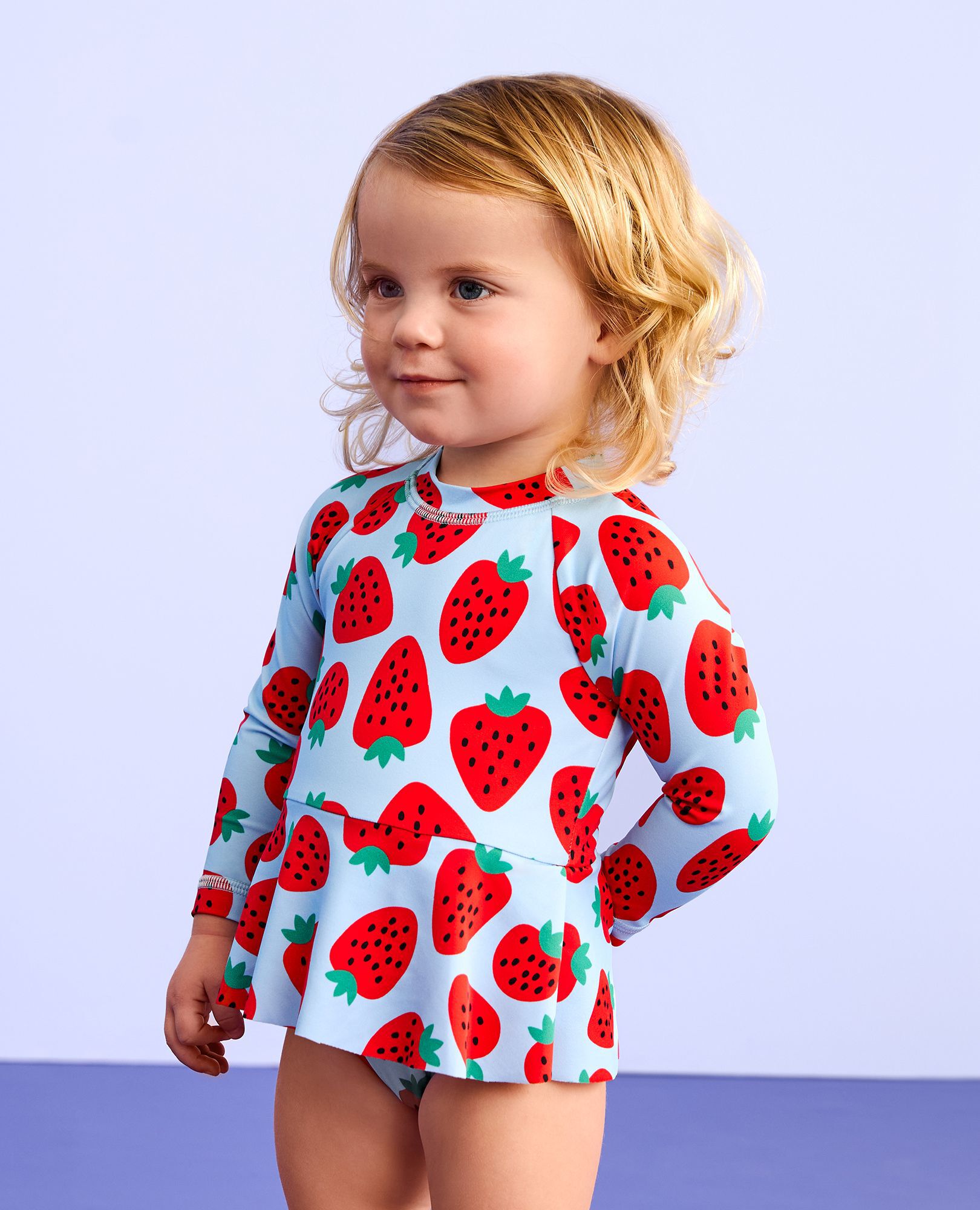 Baby One-Piece Skirted Rashguard Swimsuit in Strawberry Sweetness on Blue - main
