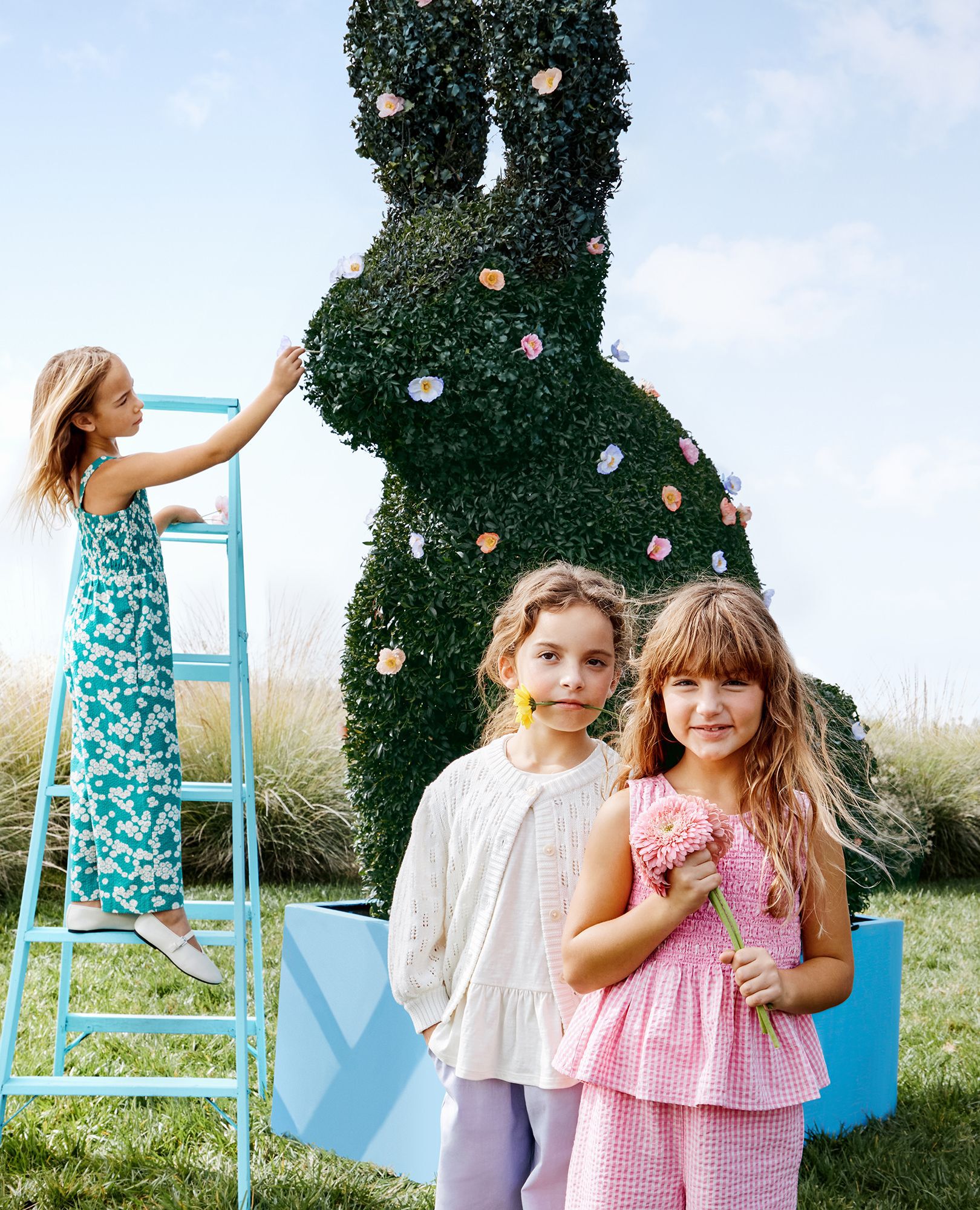 Sleeveless Seersucker Smocked Jumpsuit in Flowers on Green - main