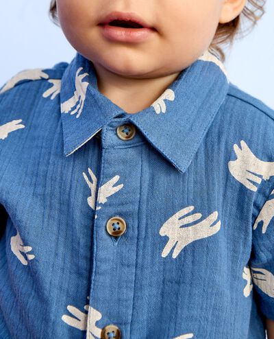 Baby Easter Muslin Romper in Hopping Bunnies on Blue - main