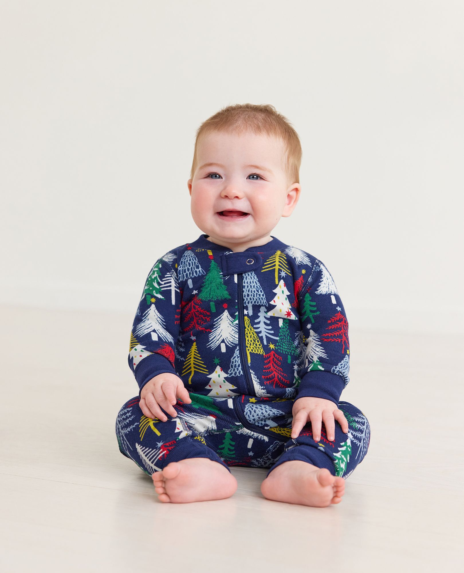 Baby Holiday Zip Sleeper in Twinkly Trees on Navy - main