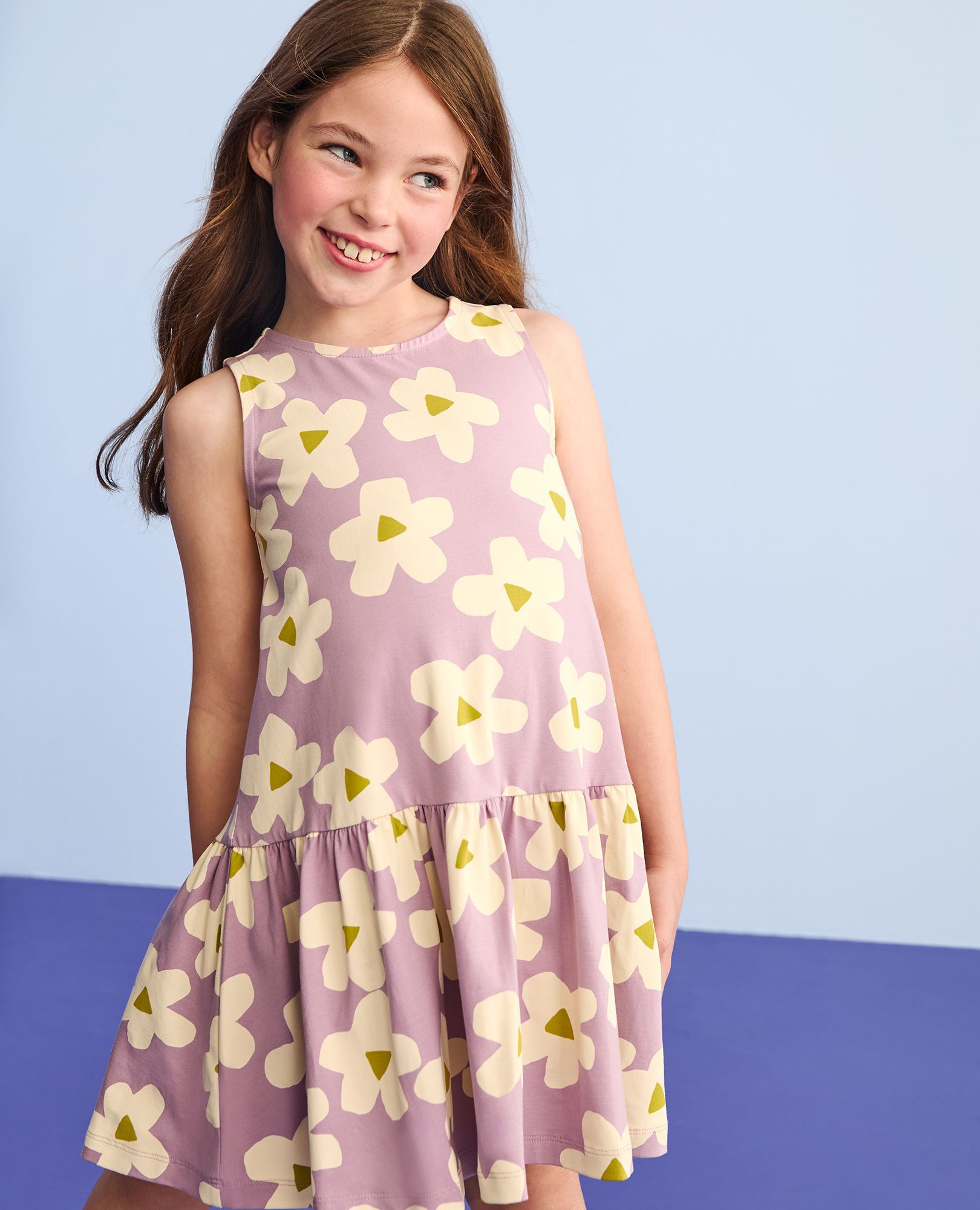 Sleeveless Drop Waist Peplum Dress in Ecru Flowers on Purple - main