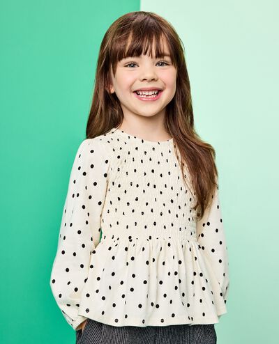 Long Sleeve Smocked Peplum Top in Black Dots on Ecru - main