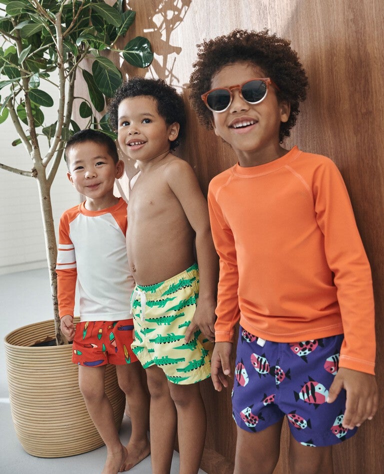 Swim Trunks in Graphic Surfboards on Orange - main