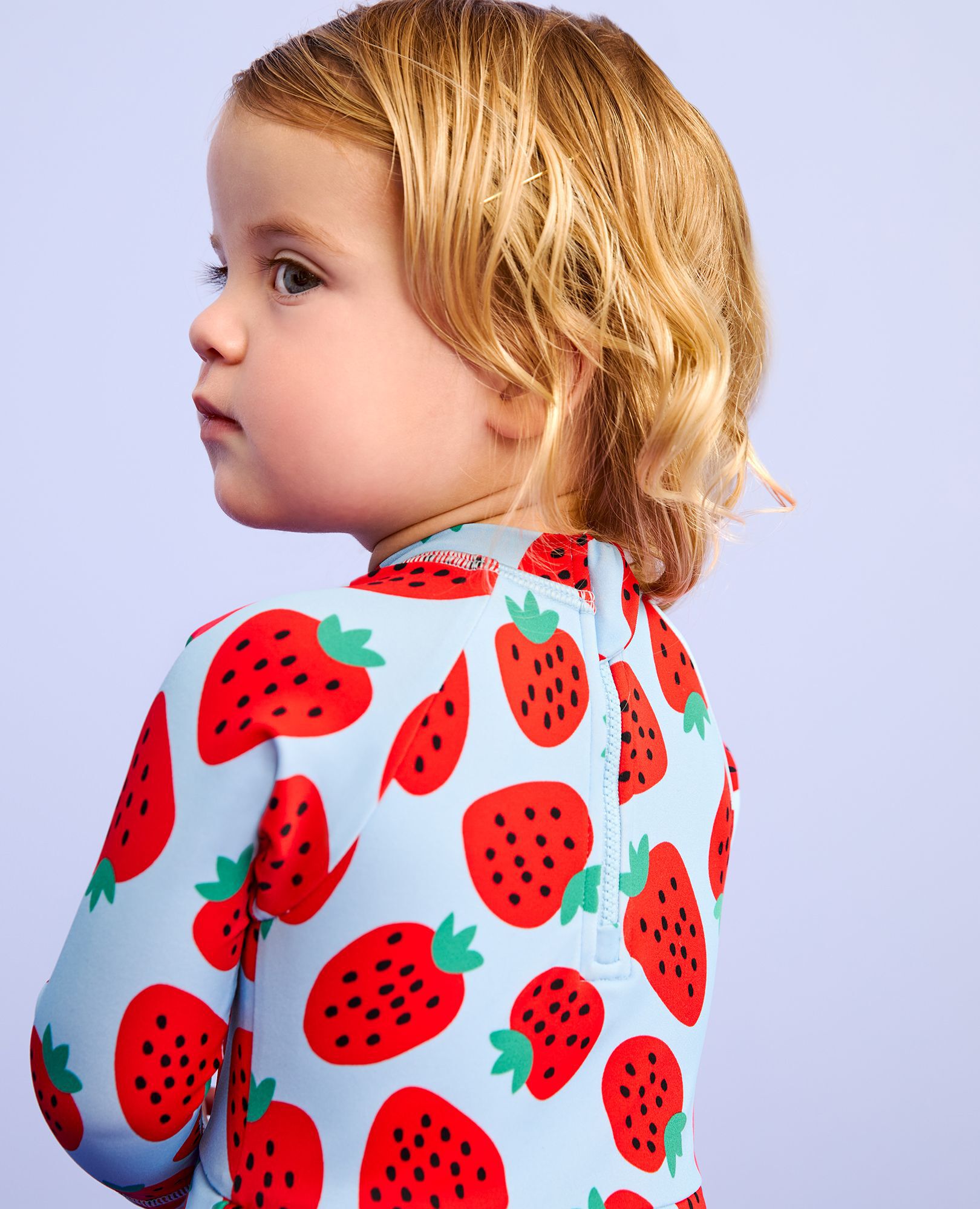Baby One-Piece Skirted Rashguard Swimsuit in Strawberry Sweetness on Blue - main