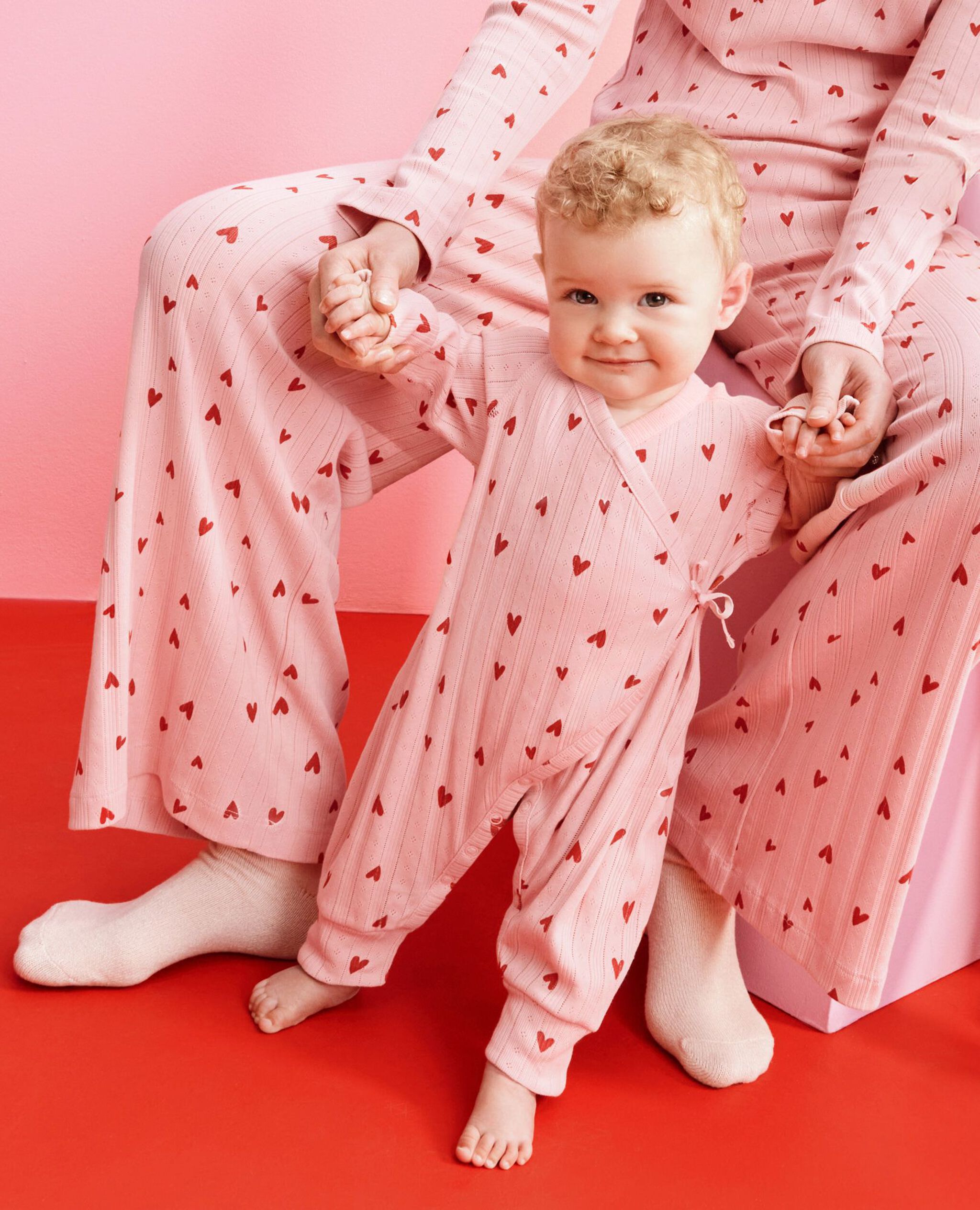 Baby Valentine's Pointelle Crossover Romper in Flourishing Hearts on Pink Frosting - main