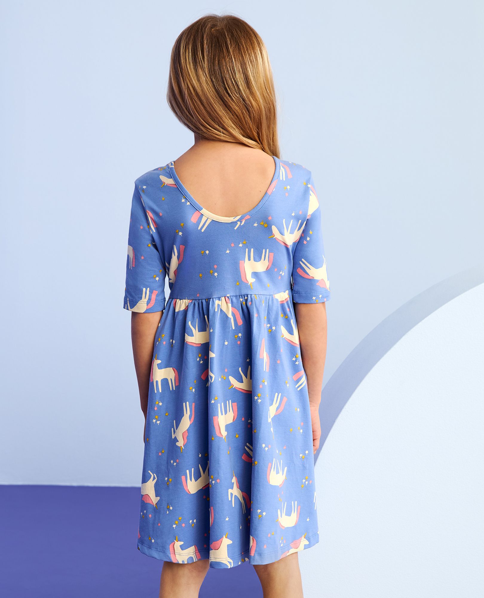 Skater Dress with Pockets in Unicorn Garden on Blue - main
