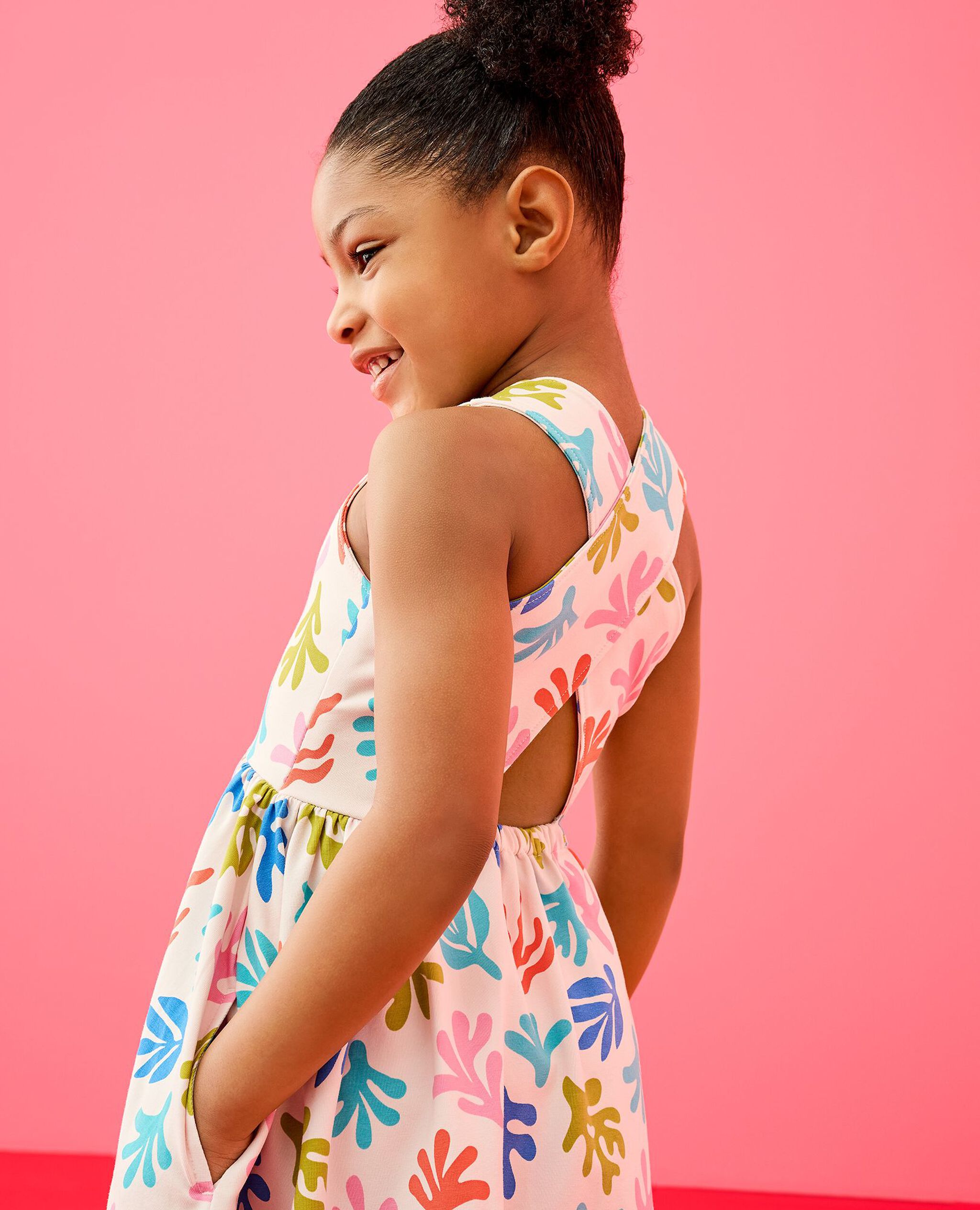 Crossback Skater Dress with Pockets in Coral on Rose Veil - main