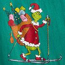 Dr. Seuss Grinch Relaxed Fit Long Sleeve T-Shirt in Grinch Skiing on Green - swatch