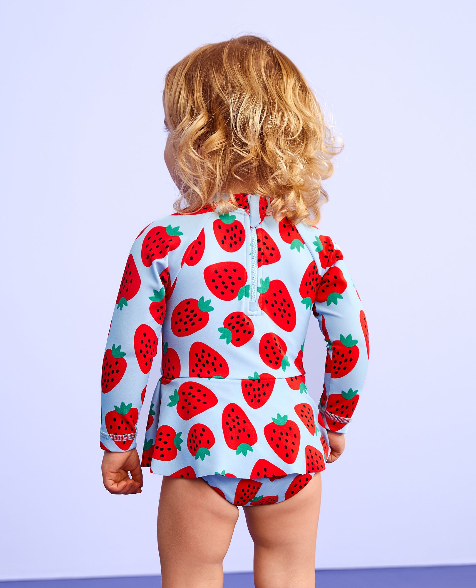Baby One-Piece Skirted Rashguard Swimsuit in Strawberry Sweetness on Blue - main