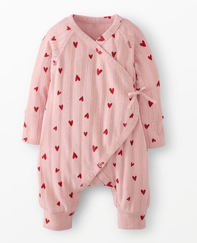 Baby Valentine's Pointelle Crossover Romper in Flourishing Hearts on Pink Frosting - main