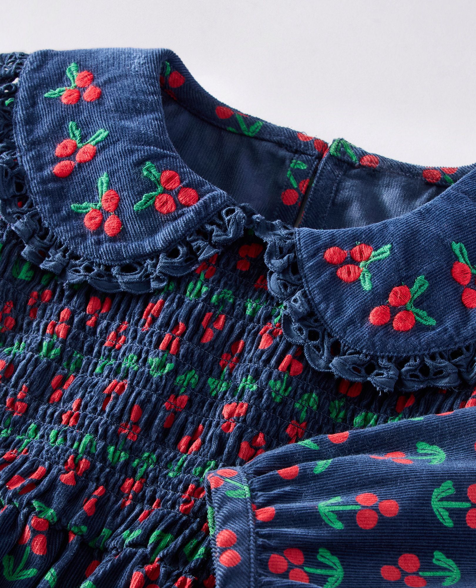 Embroidered Corduroy Dress with Pockets in Holly Berries on Midnight Blue - main