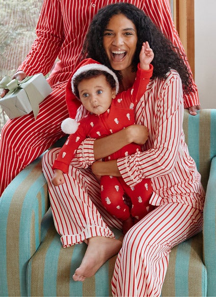 family in matching holiday pjs