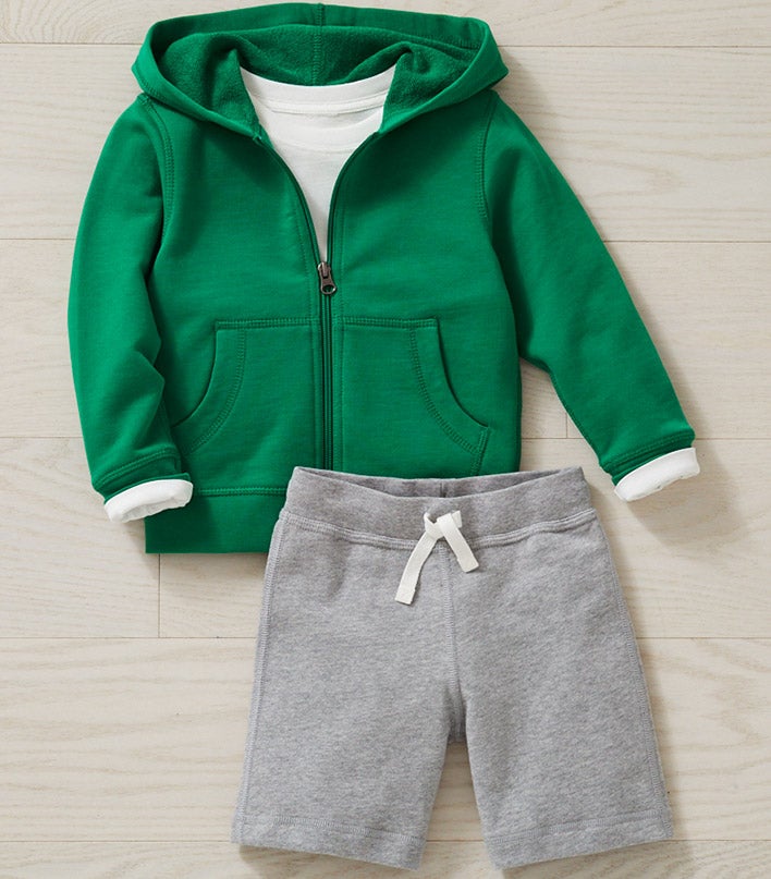 green hoodie sweatshirt with gray shorts