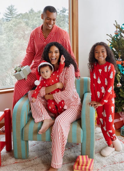 family in matching holiday pjs