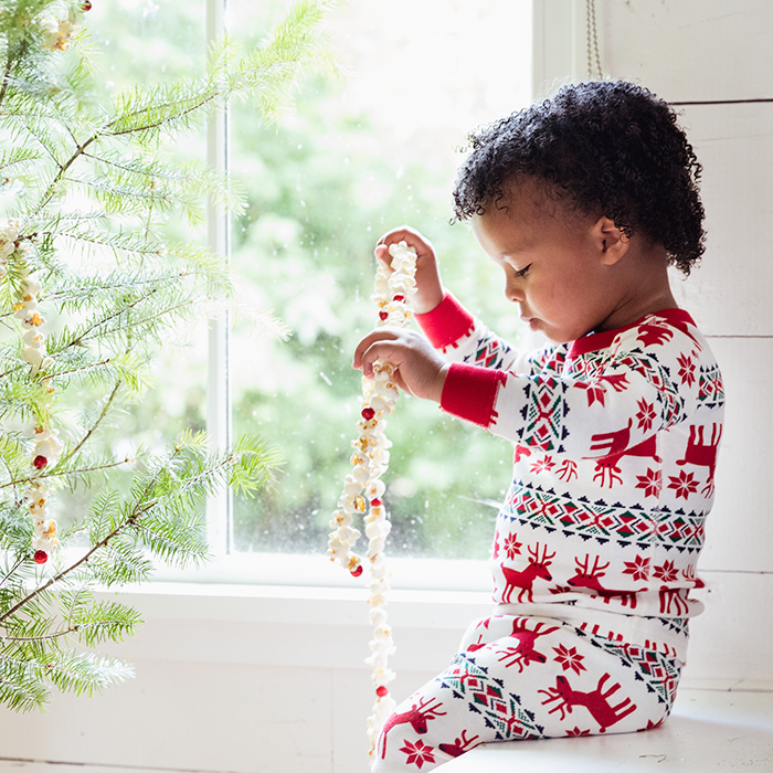 Toddler in holiday pajamas