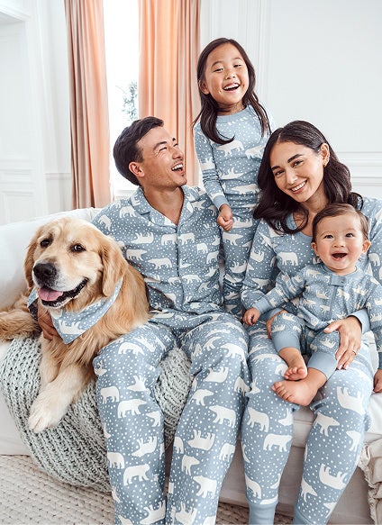 family in matching holiday pjs