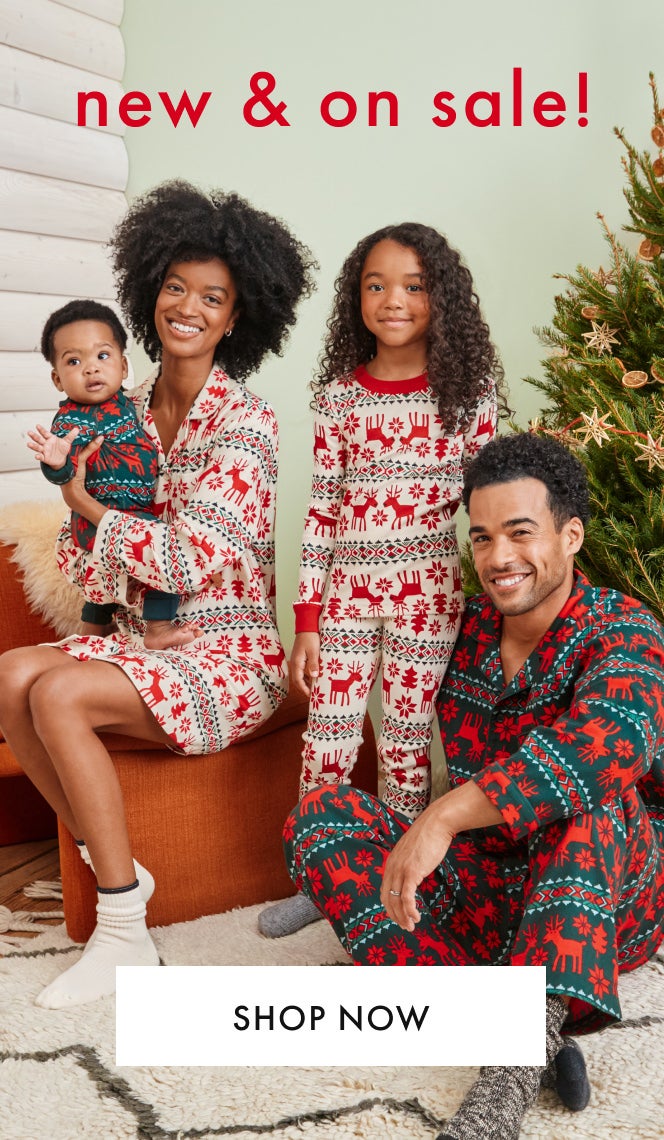 family in matching holiday pjs