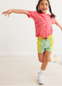 girl in tee and shorts