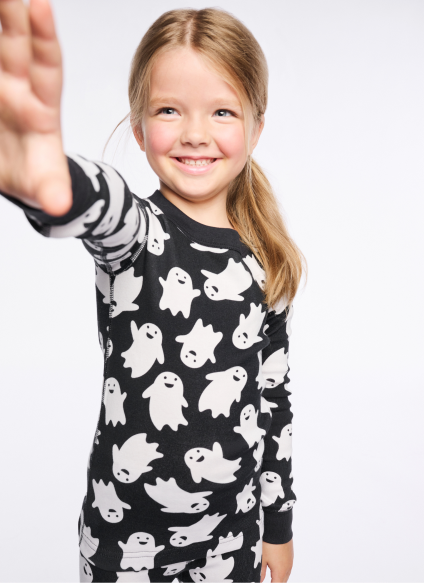 baby in print pajamas