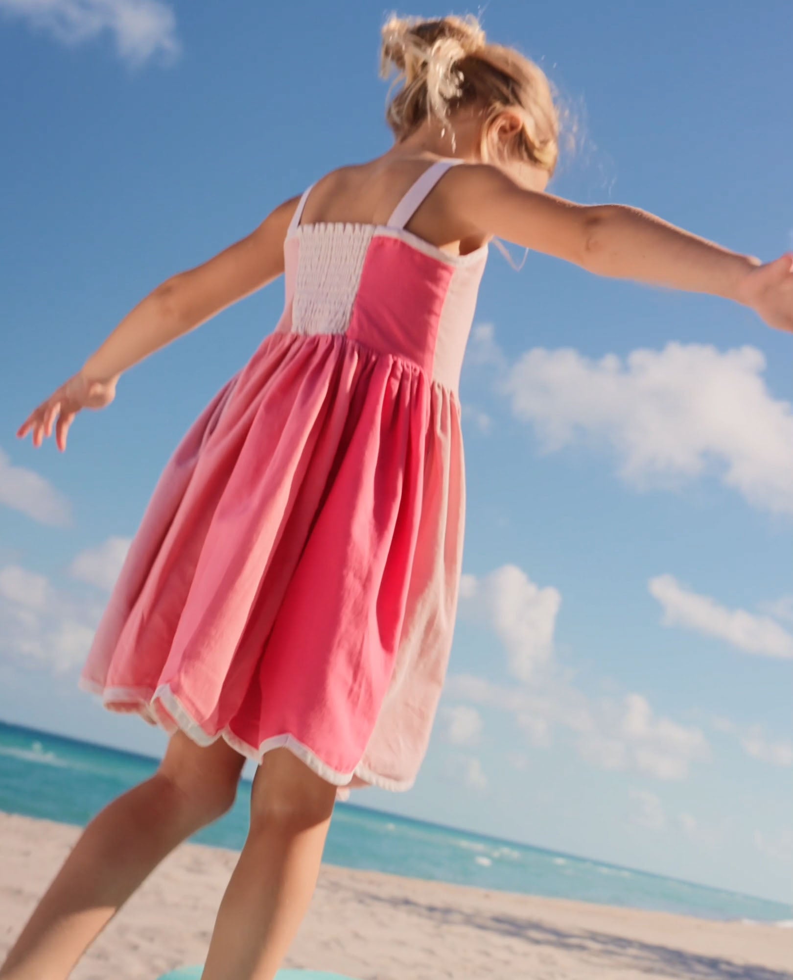 Video of child wearing Sleeveless Linen Scalloped Dress with Pockets