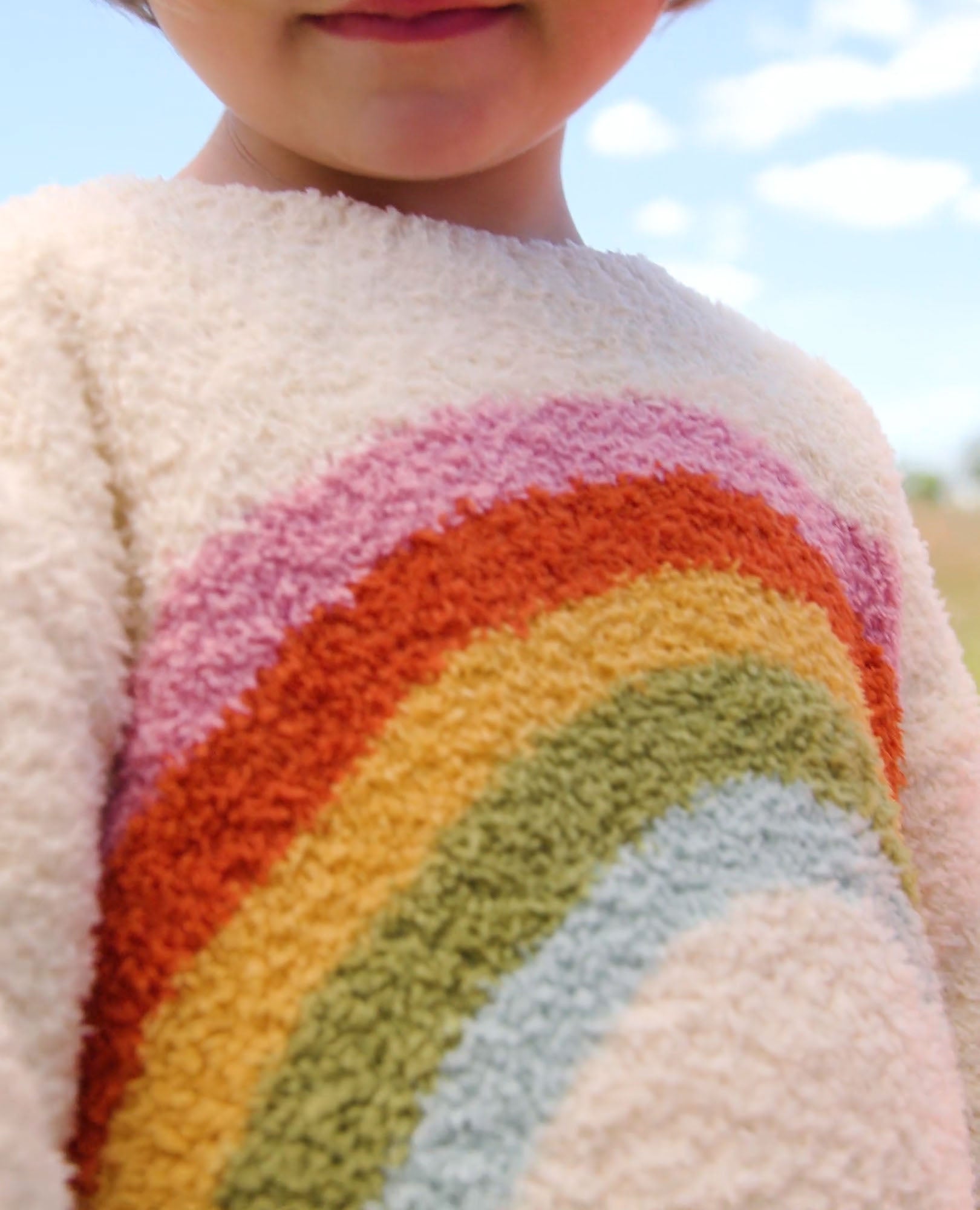 Video of child wearing Marshmallow Graphic Sweater