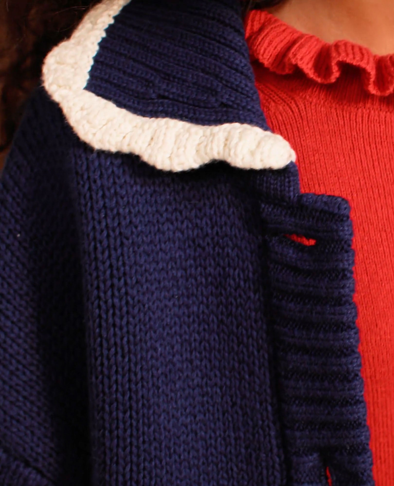 Video of child wearing Collared Bow Pocket Cardigan