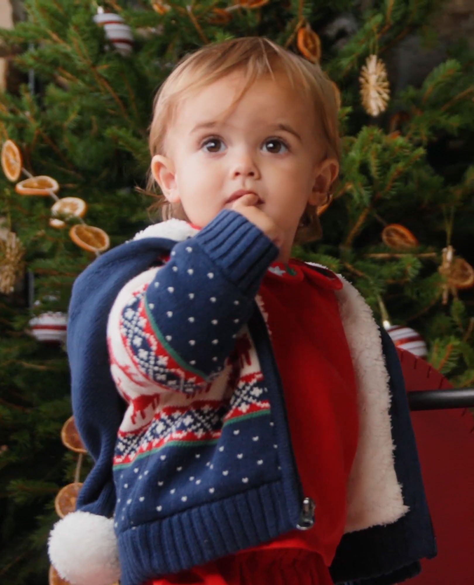 Video of child wearing Baby Holiday Sweater Jacket
