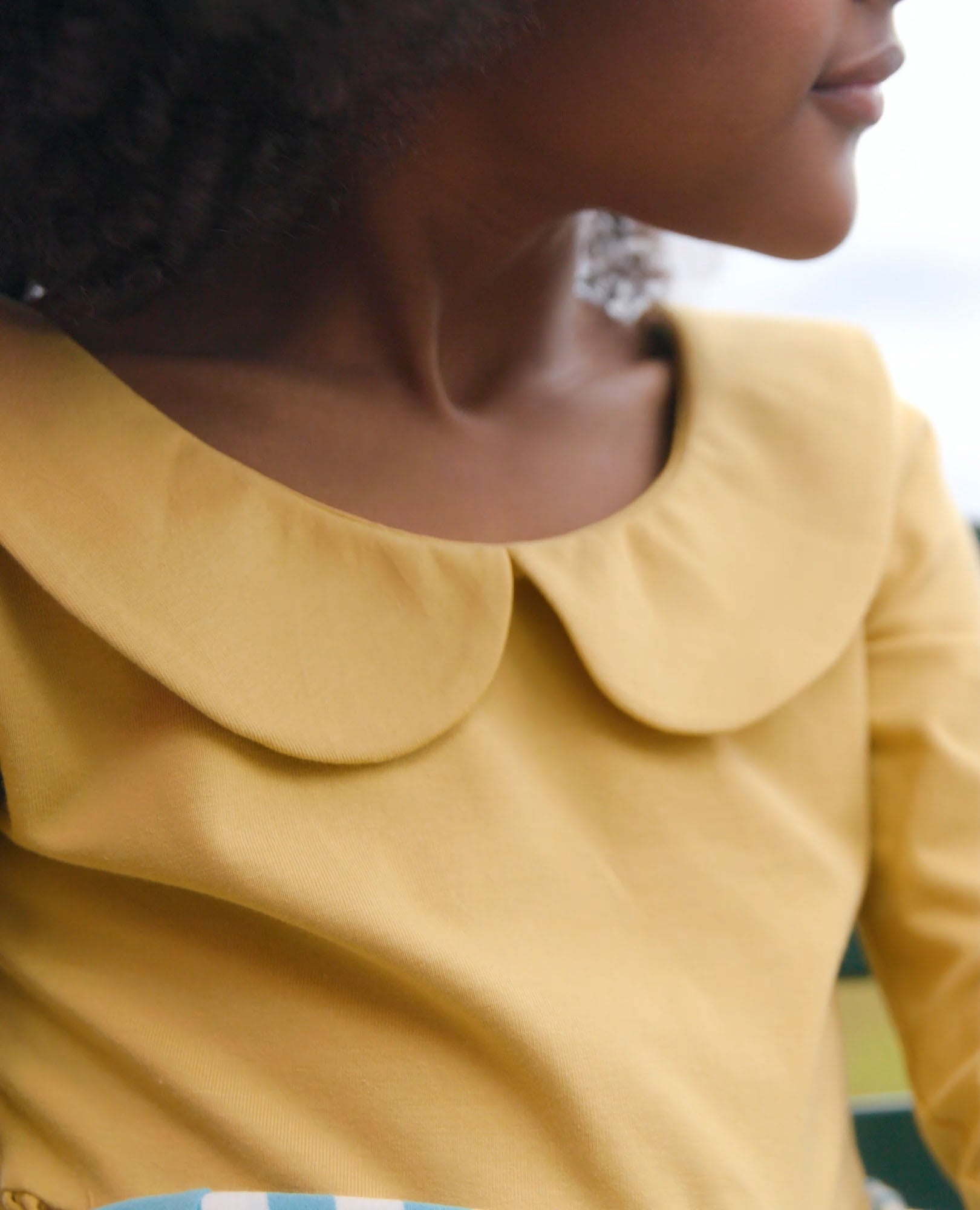 Video of child wearing Long Sleeve Collared Skater Dress with Pockets