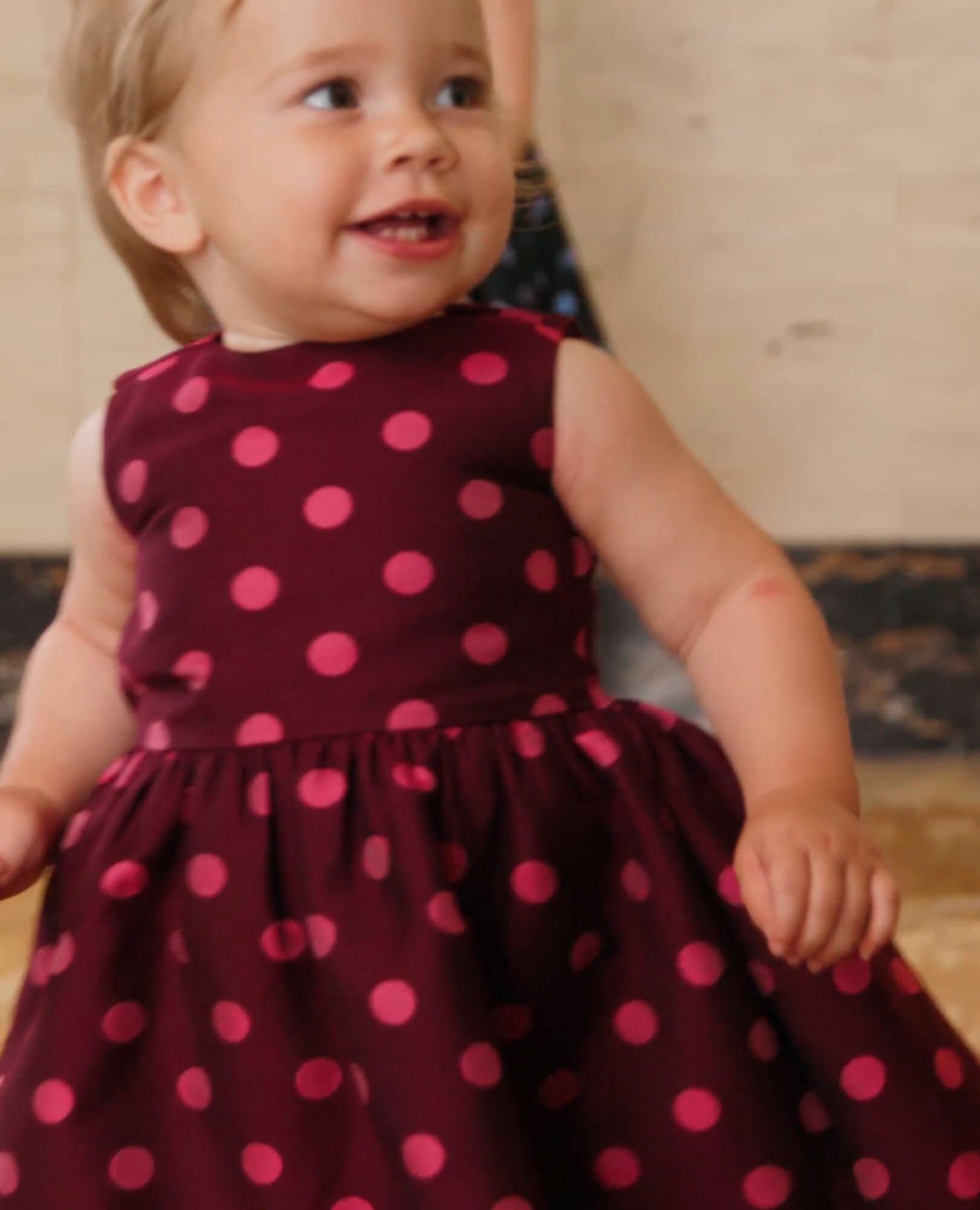 Video of child wearing Baby Sleeveless Polka Dot Dress & Bloomers Set