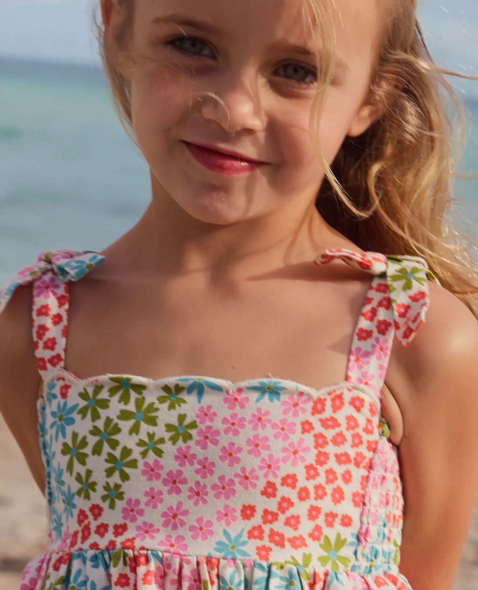 Video of child wearing Sleeveless Linen Bow Strap Dress