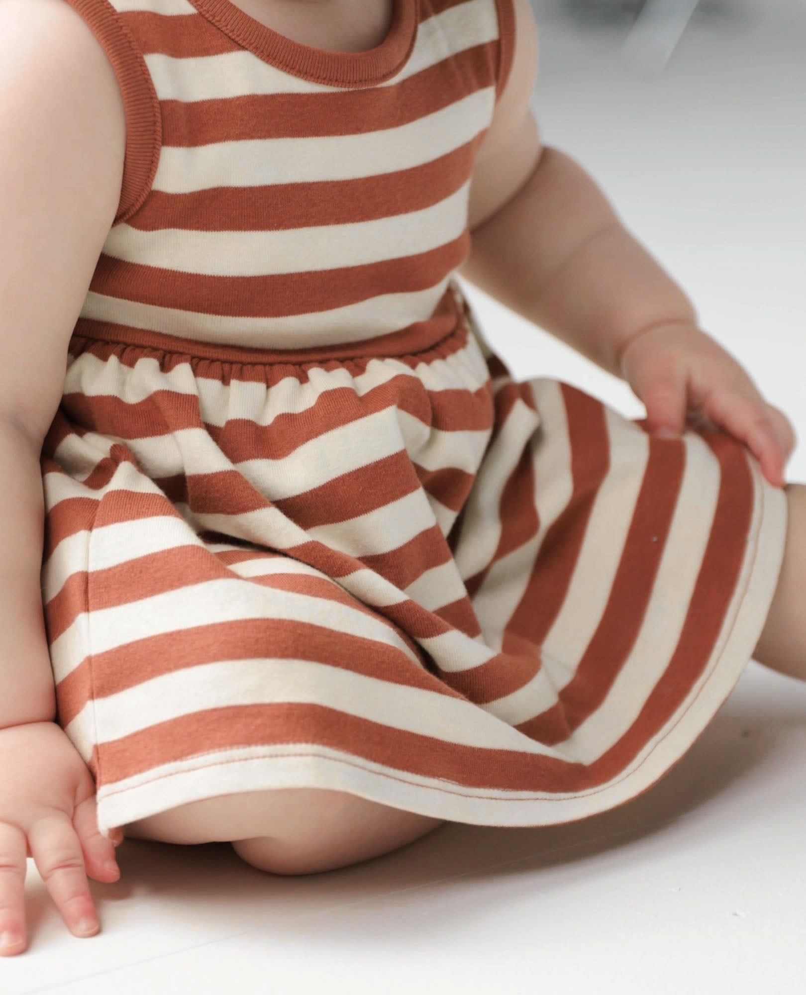 Video of child wearing Baby Sleeveless Skirted Bodysuit