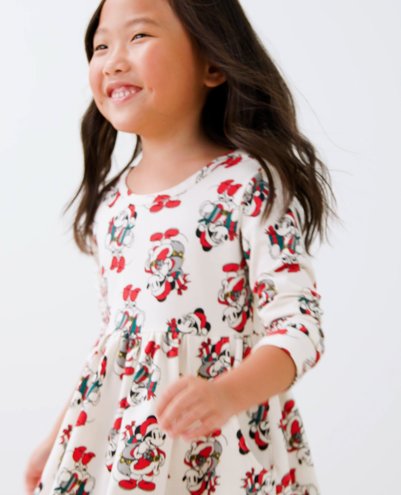 Video of child wearing Disney Mickey Mouse Holiday Long Sleeve Skater Dress with Pockets