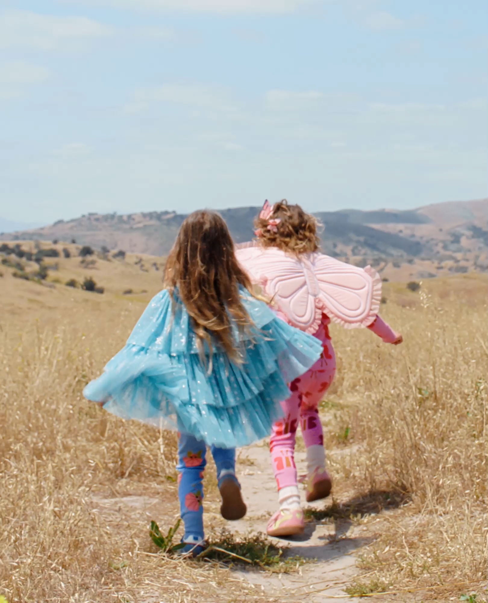 Video of child wearing Shimmer Tulle Ruffle Capelet