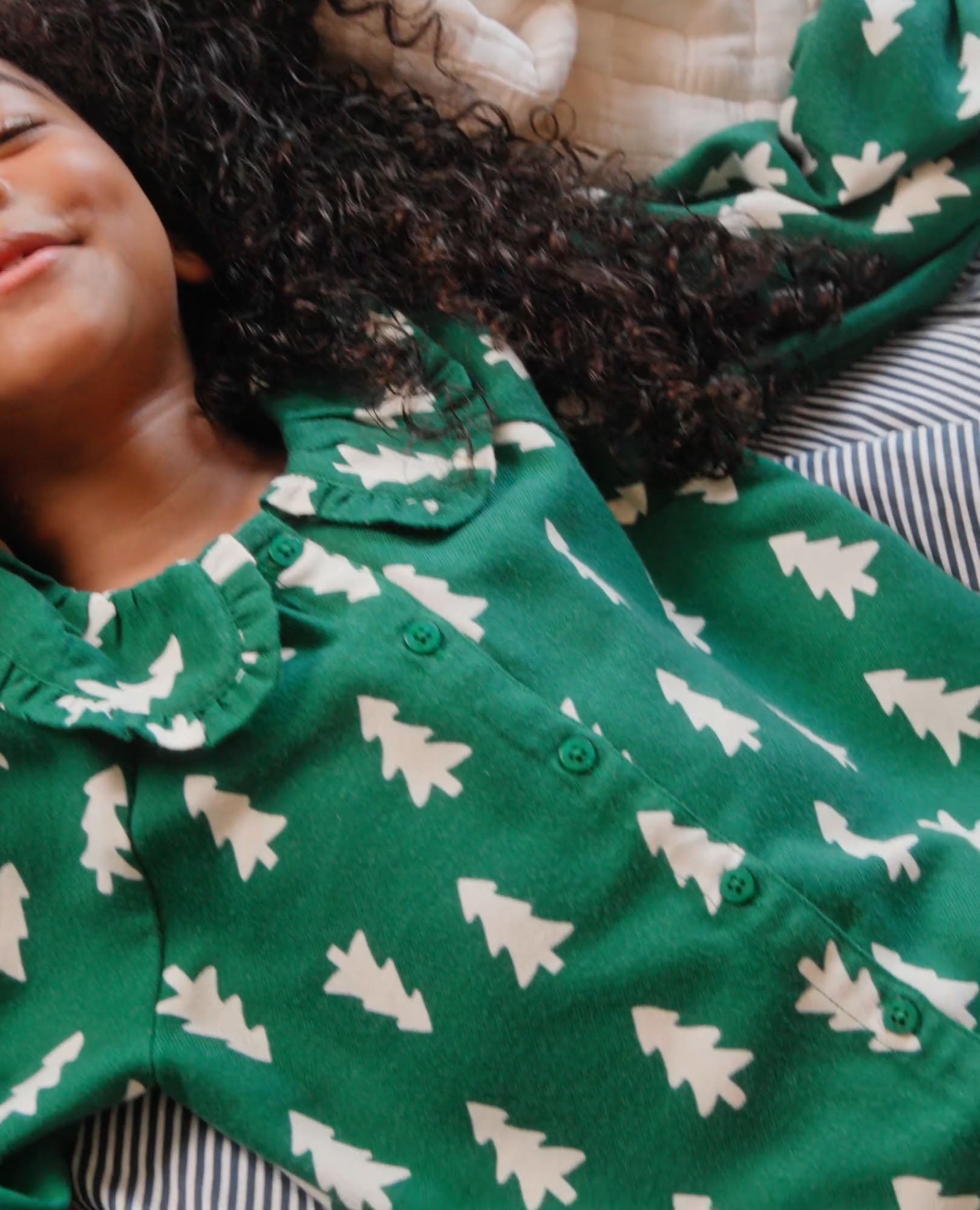 Video of child wearing Holiday Ruffle Flannel Pajama Set