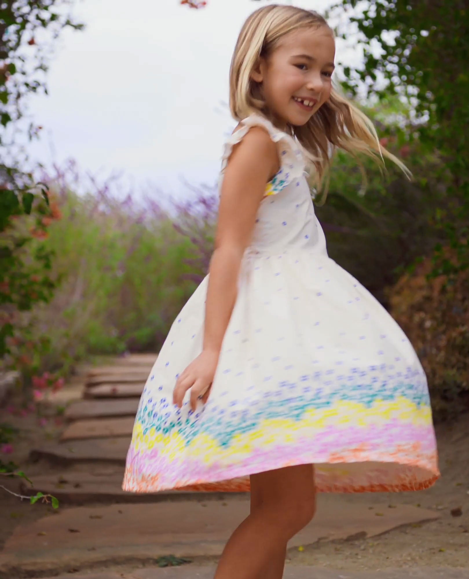 Video of child wearing Ruffle Sleeve Poplin Dress